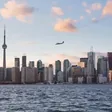 Small private plane flying toward Canada